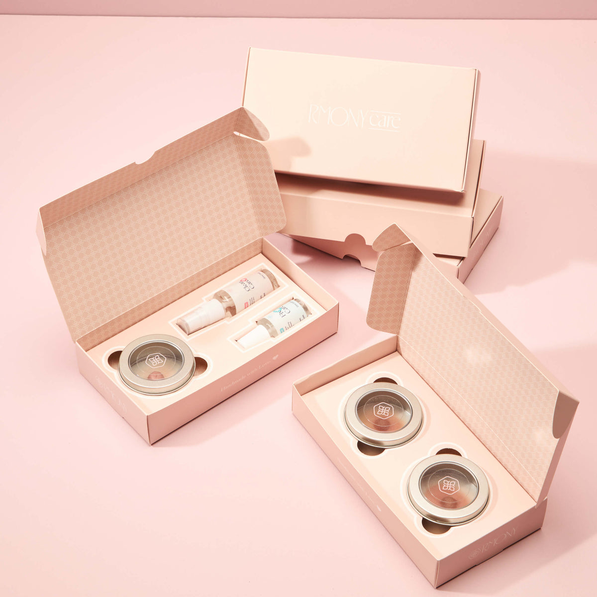 Open RmonyCare custom-made prosthesis kits showing color-matching tools and packaging